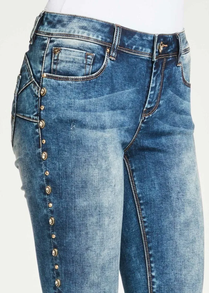 Jeans skinny cropped con borchie
