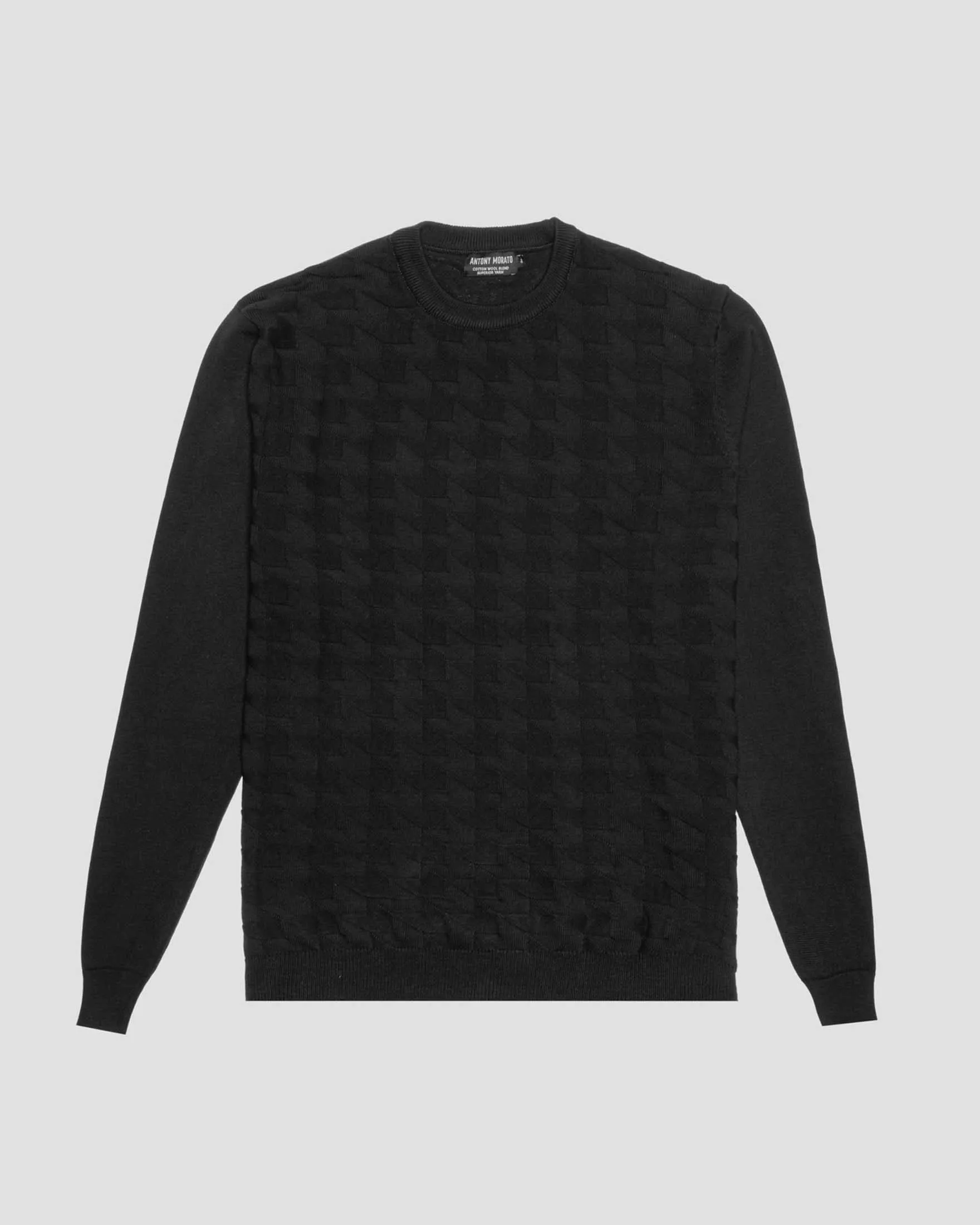 Maglia nera girocollo con lavorazione jacquard 3D