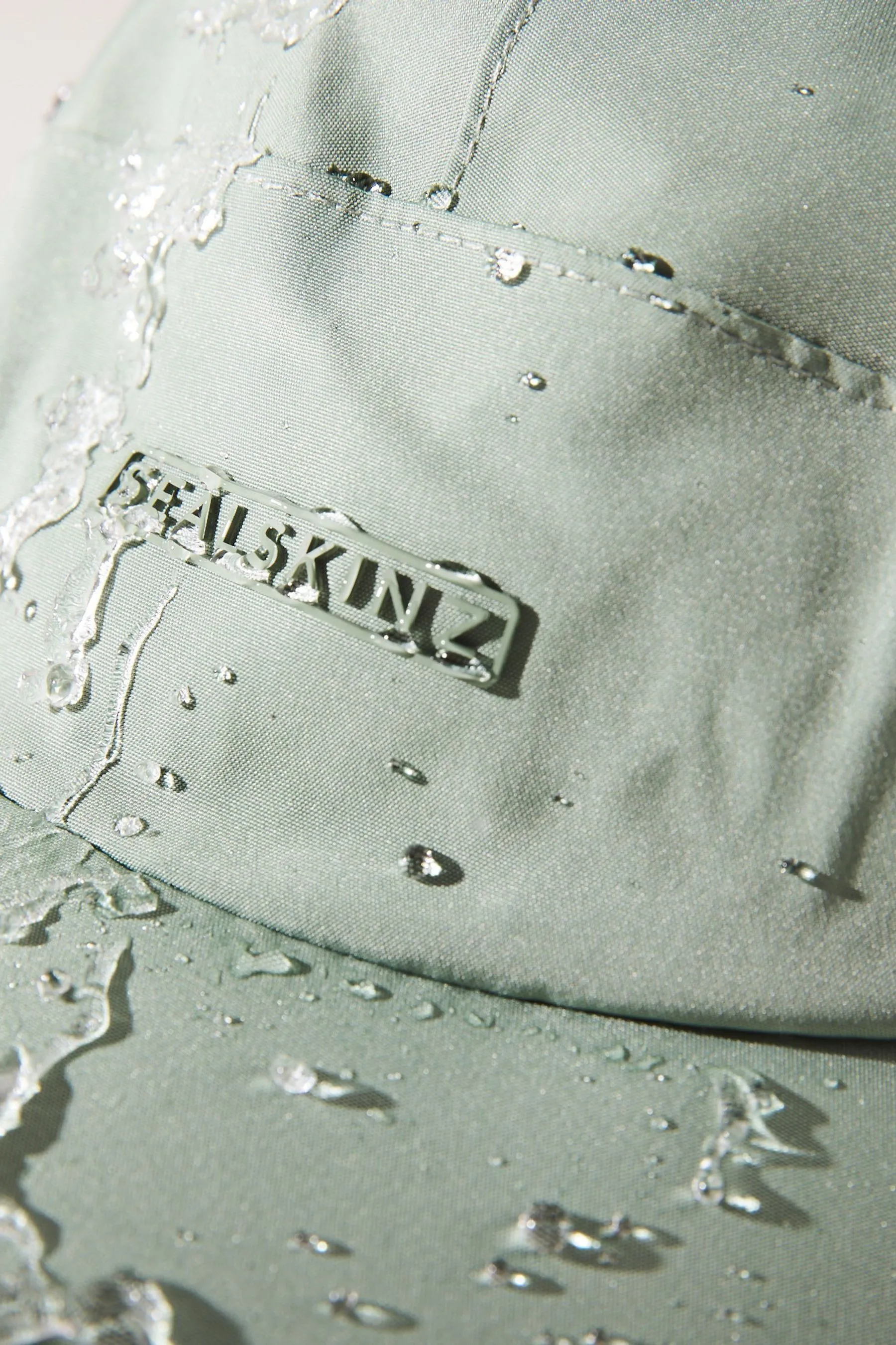 Sealkinz - Scole - Cappellino impermeabile con tasca e zip
