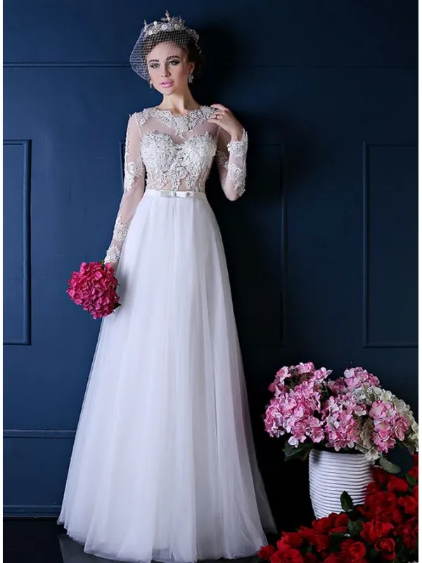 Vestito da Sposa con corpetto in pizzo e gonna in tulle a tubino semplice