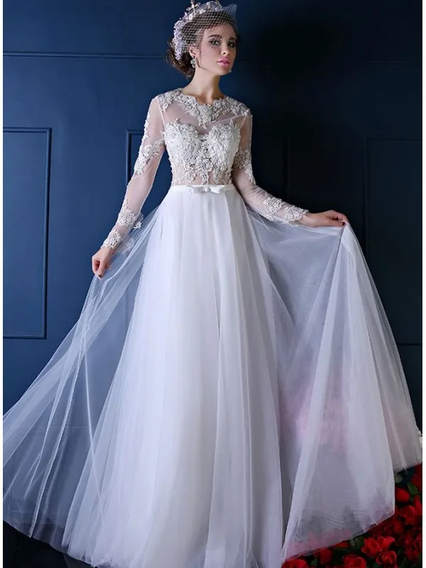 Vestito da Sposa con corpetto in pizzo e gonna in tulle a tubino semplice